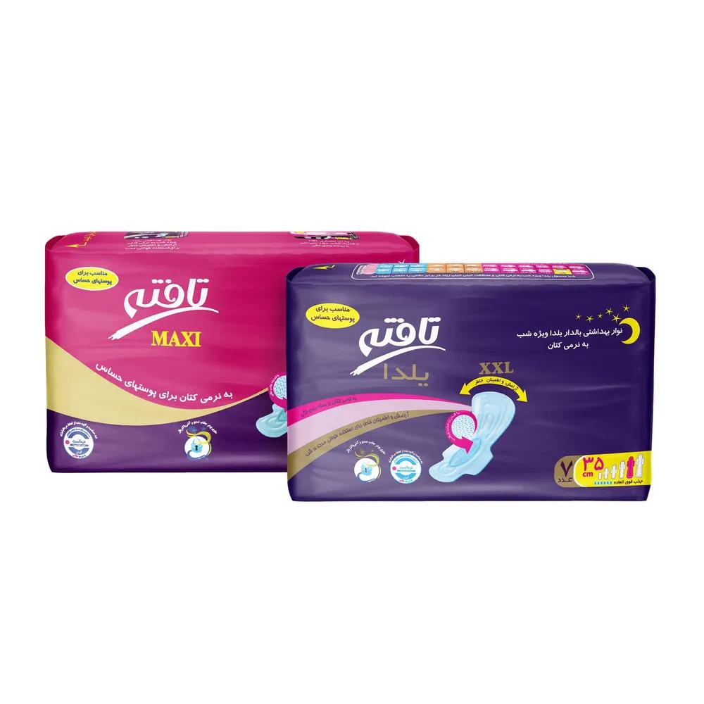 نوار بهداشتی تافته مدل Yalda Night بسته 7 عددی به همراه نوار بهداشتی بالدار مدل Maxi ویژه شب سایز XXXL بسته 5 عددی — تصویر ۱